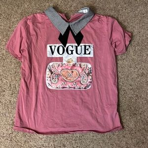 A vouge shirt. Only wore it for like 10 minutes. 😂